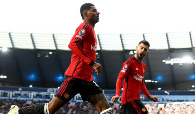 marcus-rashford-celebrates-scoring-their-first-goal-with-bruno-fernandes-reuters.jpg
